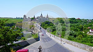The Kamianets-Podilskyi Castle and the traffic on Castle Bridge, Ukraine