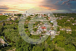 Kamianets-Podilskyi cityscape with dramatic sunset, Ukraine