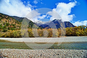 Kamikochi National Park in the Northern Japan Alps of Nagano Prefecture, Japan. Beautiful mountain in autumn leaf and Azusa river