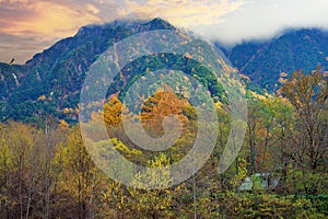 Kamikochi National Park in the Northern Japan Alps of Nagano Prefecture, Japan. Beautiful mountain in autumn leaf and Azusa river