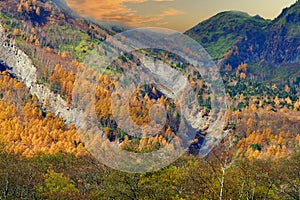 Kamikochi National Park in the Northern Japan Alps of Nagano Prefecture, Japan. Beautiful mountain in autumn leaf and Azusa river