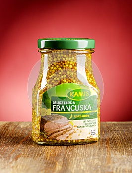 Kamis mustard on gradient background.