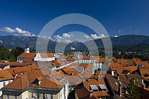Kamnik town in front of alps photo