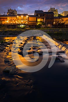 Kamogawa river nearby Gion in sunset