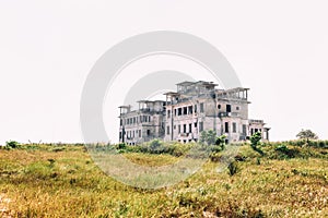 Kampot, Cambodia - January 27, 2015: Abandoned hotel 'Bokor Palace' in Ghost town Bokor Hill station near the town of Kampot. Ca