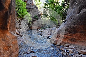 Kanarraville Falls, views from along the hiking trail of falls, stream, river, sandstone cliff formations Waterfall in Kanarra Cre