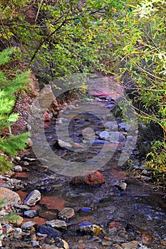 Kanarraville Falls, views from along the hiking trail of falls, stream, river, sandstone cliff formations Waterfall in Kanarra Cre