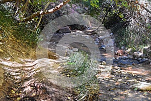 Kanarraville Falls, views from along the hiking trail of falls, stream, river, sandstone cliff formations Waterfall in Kanarra Cre