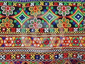 kanch kachhi work art. fabric hand work design on the traditional cloth.