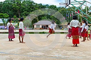 Group of students playing traditional game together