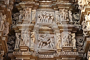 KANDARIYA MAHADEV TEMPLE:  Erotic Sculptures, South wall, Mandapa and Sanctuary, Western Group, Khajuraho, Madhya Pradesh,