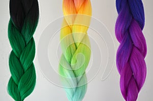 Kanekalon. Colored artificial strands of hair. Material for plaiting braids.