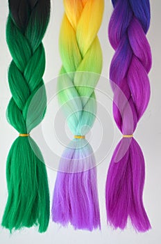Kanekalon. Colored artificial strands of hair. Material for plaiting braids.