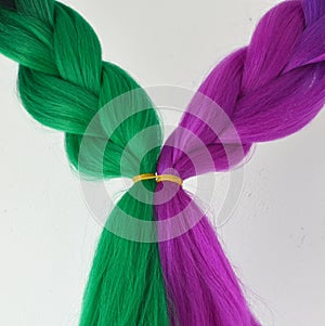 Kanekalon. Colored artificial strands of hair. Material for plaiting braids.