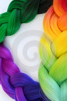 Kanekalon. Colored artificial strands of hair. Material for plaiting braids.