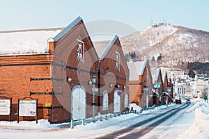 Kanemori Red Brick Warehouse with Snow in winter. landmark and popular for attractions in Hokkaido, Japan.Hakodate, Hokkaido,