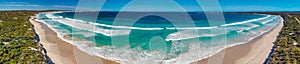 Kangaroo Island, Australia. Pennington Bay waves and coastline, panoramic aerial view from drone at sunset