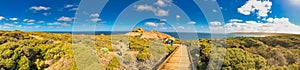 Kangaroo Island, Australia - September 13, 2018: Cape Du Couedic with tourists. Panoramic aerial view of Remarkable Rocks