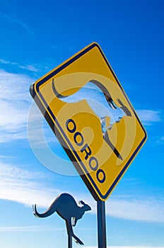 Kangaroo sign in yellow at a public park for decoration with blue sky at the background in Sydney Australia.