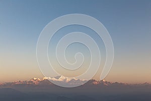 Kangchenjunga mountain in the morning with blue and orange sky that view from The Tiger Hill in winter at Tiger Hill, Darjeeling