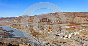 Kangerlussuaq greenlandic town aerial view on the living blocks and runway of the airport photo