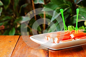 Kani or Crab sticks served with wasabi soy sauce and Wasabi Japanese traditional food