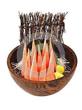 Kani Kamaboko Surimi or crab stick  served on ice in Japanese wooden bow