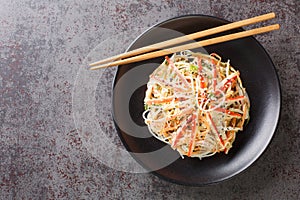 Kani or kanikama salad is a Japanese crab salad that is a delicious mix of crab meat crunchy cucumber and carrots and spicy