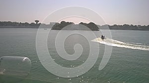 Kankaria lake view with a motor boat and central island