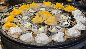 Kanom Krok, Sweet and savory grilled coconut-rice hotcakes. Asia