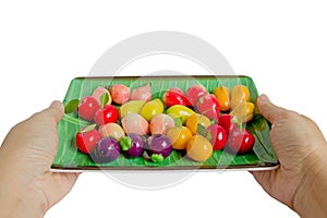 Kanom Look Choup : Thai traditional dessert made from green been, coconut milk, sugar and jelly in fruit shape