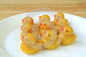 Kanom-Look-Choup, Thai Traditional Mung Beans Baby Ducks Shaped Marzipan Sweets Served on White Plate