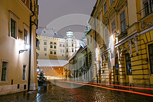 Kanonicza street at night with Wawel Castle in the background, Krakow, Poland