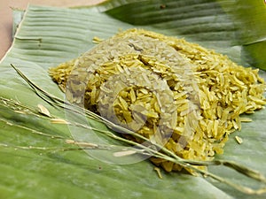Kao Mao is name of pounded unripe rice wrapped banana leaf,Thailand dessert.