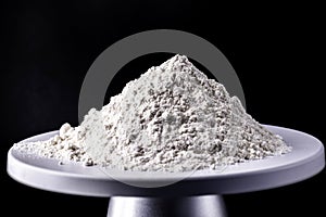 Kaolin, on a weighing scale, kaolin is a mineral of inorganic constitution, chemically inert, extracted from deposits and