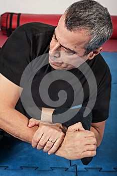 Kapap instructor demonstrates ground fighting techniques