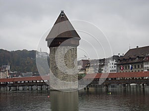 KapellbrÃ¼cke (Chapel Bridge and Octagonal Tower). Lucerne, Switzerland. photo