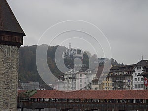 KapellbrÃ¼cke (Chapel Bridge and Octagonal Tower). Lucerne, Switzerland. photo