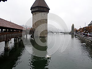 KapellbrÃ¼cke (Chapel Bridge and Octagonal Tower). Lucerne, Switzerland. photo