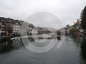 View from KapellbrÃ¼cke (Chapel Bridge and Octagonal Tower). Lucerne, Switzerland. photo