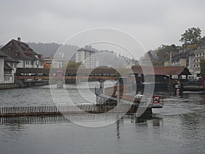 KapellbrÃ¼cke (Chapel Bridge and Octagonal Tower). Lucerne, Switzerland. photo