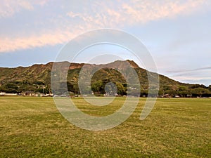 Kapiolani Park at dusk with Diamond Head and clouds