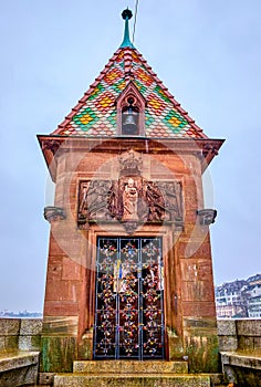 Kappelijoch chapel on the middle of Mittlere Brucke in Basel, Switzerland photo