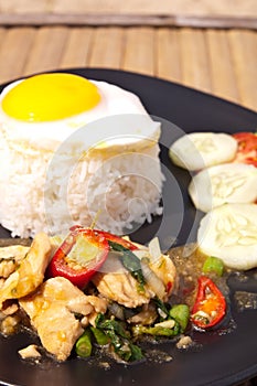 Kaprao kai (chicken basil with rice and egg)