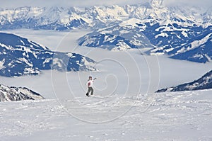 Kaprun, Woman and Kitzsteinhorn glacier. Austria