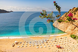 Kaputas beach in Antalya region, Turkey with clear turquoise water, sun umbrellas and sandy beach
