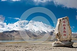 Karakul Lake Monument at Karakul Lake in Pamir Mountains, Akto County,Kizilsu Kirghiz Autonomous Prefecture, Xinjiang, China.