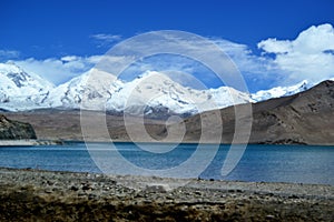 Karakul lake and pamir mountains in Xinjiang, Karakorum highway, China