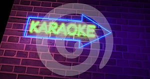 Karaoke neon sign glowing above bar or open mic establishment - 4k