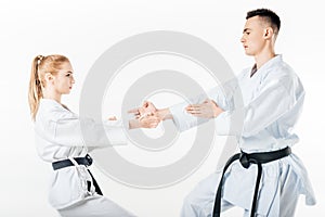 karate fighters standing in poses